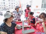 鲅魚(yú)圈：紅心公益第四次走進(jìn)金海社區(qū)